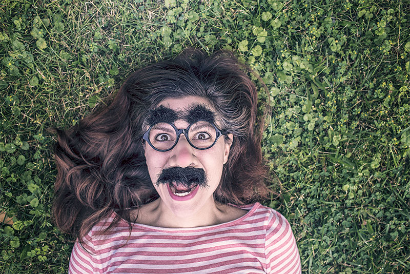Woman with Groucho Marx mask